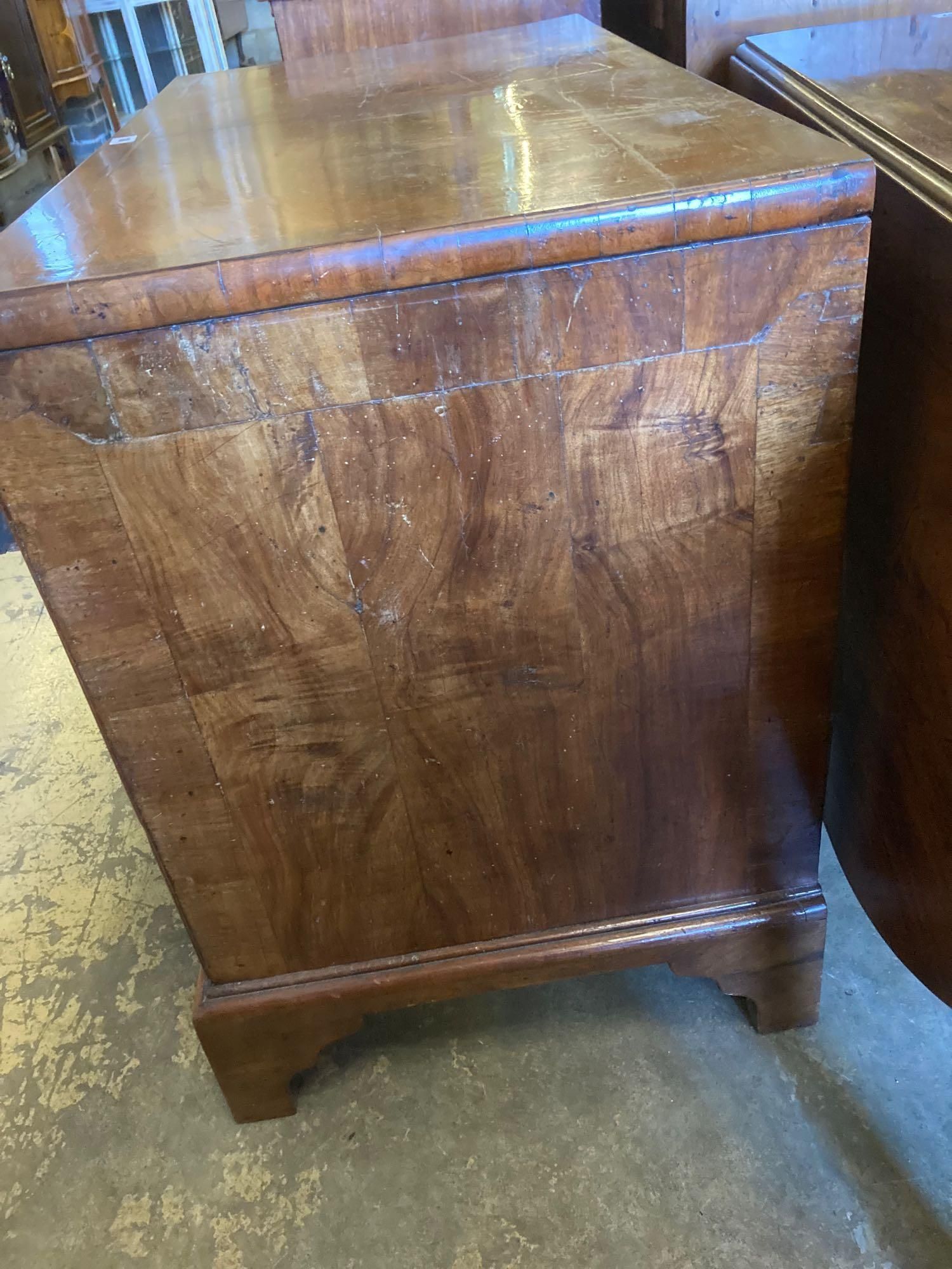 A walnut kneehole dressing table/desk, incorporating antique timbers, width 95cm height 75cm